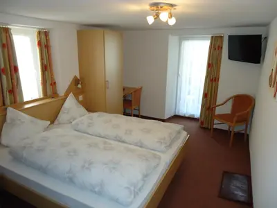 Ein Bett oder Betten in einem Zimmer der Unterkunft Hotel Monte-Moro