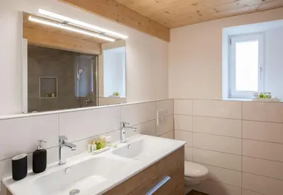 Ein Badezimmer in der Unterkunft Le Manoir Penthouse