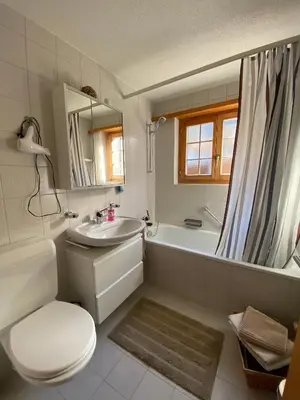 Ein Badezimmer in der Unterkunft Ferienwohnung Résidence Sonnegg - Hein