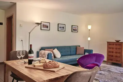 Ein Sitzbereich in der Unterkunft Apartment Trümmelbach, Comfortabl & Cozy, Private Terrace with best views