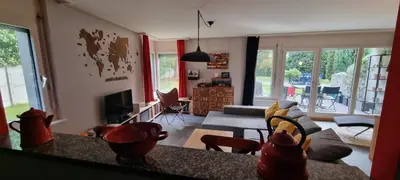 Ein Sitzbereich in der Unterkunft Appartement avec terrasse et parking