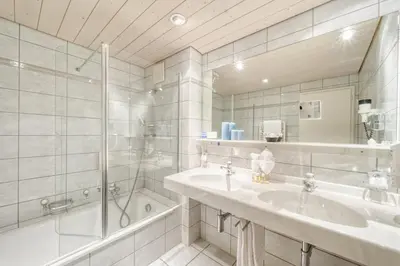 Ein Badezimmer in der Unterkunft Hotel Simi