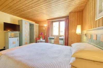 Ein Bett oder Betten in einem Zimmer der Unterkunft Hotel Simi