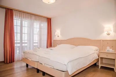 Ein Bett oder Betten in einem Zimmer der Unterkunft Apartment Stotzhalten 3.5 - GriwaRent AG