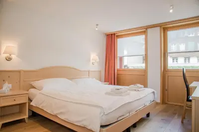 Ein Bett oder Betten in einem Zimmer der Unterkunft Apartment Stotzhalten 3.5 - GriwaRent AG