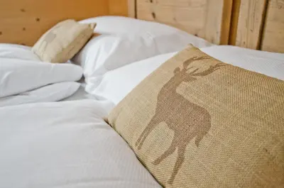 Ein Bett oder Betten in einem Zimmer der Unterkunft Apartment Bäreggblick - GRIWA RENT AG