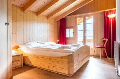 Ein Bett oder Betten in einem Zimmer der Unterkunft Apartment Schneerose - GRIWA RENT AG