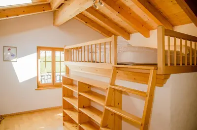 Ein Etagenbett oder Etagenbetten in einem Zimmer der Unterkunft Apartment Chamonix - GRIWA RENT AG
