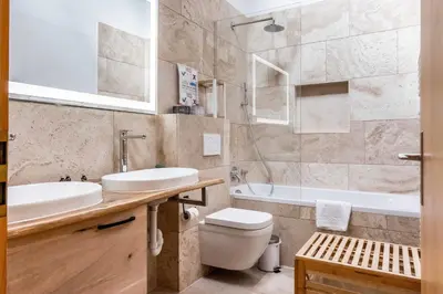 Ein Badezimmer in der Unterkunft Apartment Alpin DG - GRIWA RENT AG