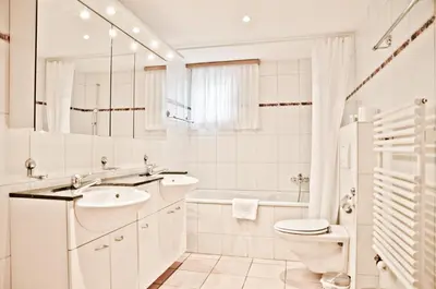 Ein Badezimmer in der Unterkunft Apartment St. Louis 3.5 - GriwaRent AG