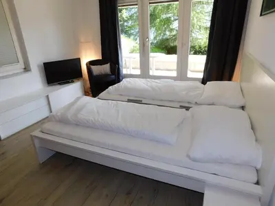 Ein Bett oder Betten in einem Zimmer der Unterkunft Residence Edelweiss C313