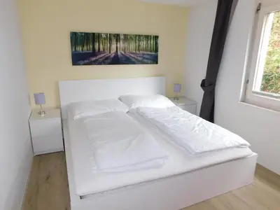 Ein Bett oder Betten in einem Zimmer der Unterkunft Residence Edelweiss C313