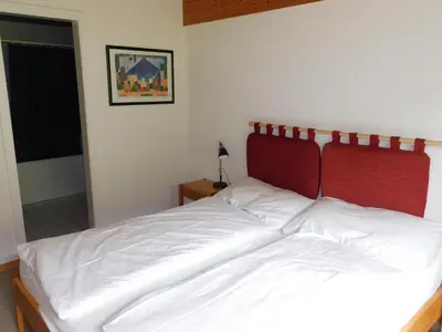 Ein Bett oder Betten in einem Zimmer der Unterkunft Residence Edelweiss A131