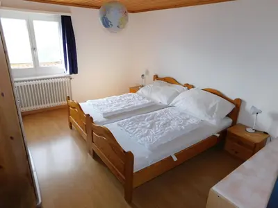 Ein Bett oder Betten in einem Zimmer der Unterkunft Ferienwohnung Alter Konsum