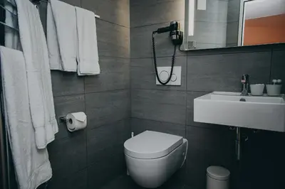 Ein Badezimmer in der Unterkunft Hotel Dakota