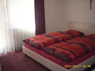 Ein Bett oder Betten in einem Zimmer der Unterkunft Haus Apollo