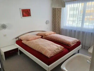 Ein Bett oder Betten in einem Zimmer der Unterkunft Haus Apollo