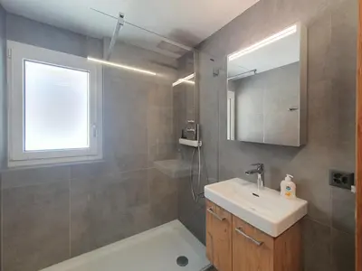Ein Badezimmer in der Unterkunft Waldrain 5