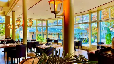 Ein Restaurant oder anderes Speiselokal in der Unterkunft Parkhotel du Sauvage