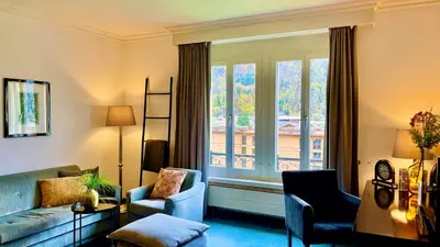 Ein Sitzbereich in der Unterkunft Parkhotel du Sauvage