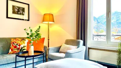 Ein Sitzbereich in der Unterkunft Parkhotel du Sauvage