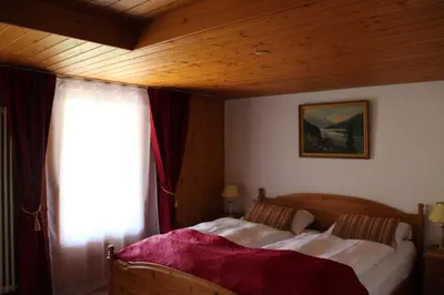 Ein Bett oder Betten in einem Zimmer der Unterkunft Historic Hotel Steinbock