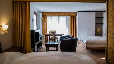 Ein Bett oder Betten in einem Zimmer der Unterkunft Hotel Astoria