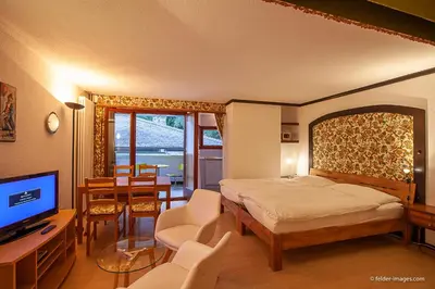 Ein Bett oder Betten in einem Zimmer der Unterkunft Hotel Astoria