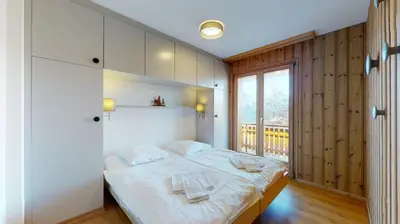 Ein Bett oder Betten in einem Zimmer der Unterkunft Cozy apartment in Veysonnaz, close to the slopes of the 4 Valleys