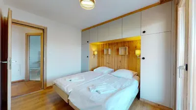 Ein Bett oder Betten in einem Zimmer der Unterkunft Cozy apartment in Veysonnaz, close to the slopes of the 4 Valleys