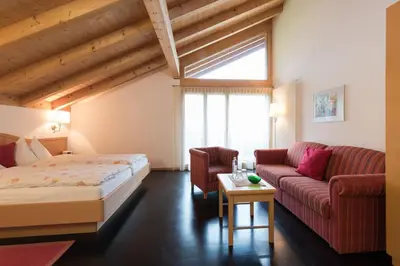 Ein Bett oder Betten in einem Zimmer der Unterkunft Blümlisalp