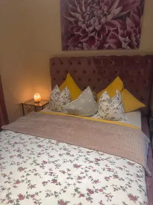 Ein Bett oder Betten in einem Zimmer der Unterkunft Bahnhof West Apartments
