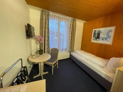 Ein Bett oder Betten in einem Zimmer der Unterkunft Dinh Residence