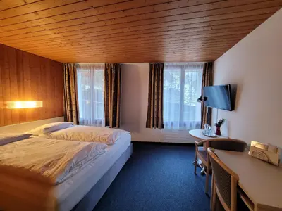 Ein Bett oder Betten in einem Zimmer der Unterkunft Dinh Residence