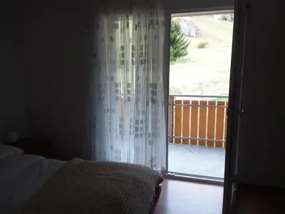 Ein Bett oder Betten in einem Zimmer der Unterkunft Ferienwohnung 