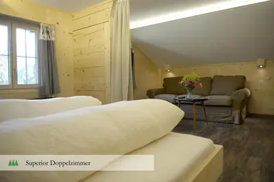 Ein Bett oder Betten in einem Zimmer der Unterkunft Hotel Waldrand
