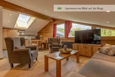 Ein Sitzbereich in der Unterkunft Hotel Waldrand