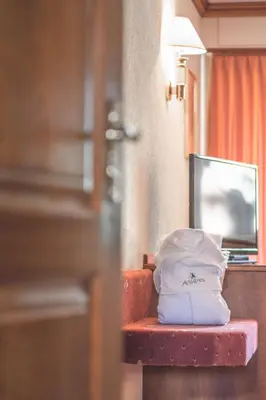 Ein Bett oder Betten in einem Zimmer der Unterkunft Antares Hotel