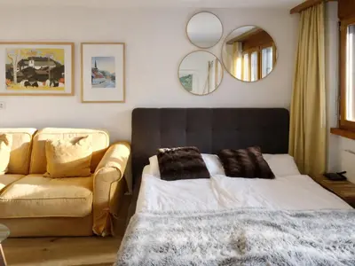 Ein Bett oder Betten in einem Zimmer der Unterkunft Bright studio with balcony & view to the Matterhorn