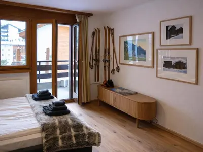 Ein Bett oder Betten in einem Zimmer der Unterkunft Bright studio with balcony & view to the Matterhorn