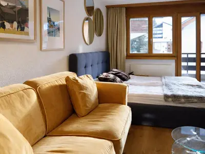 Ein Bett oder Betten in einem Zimmer der Unterkunft Bright studio with balcony & view to the Matterhorn