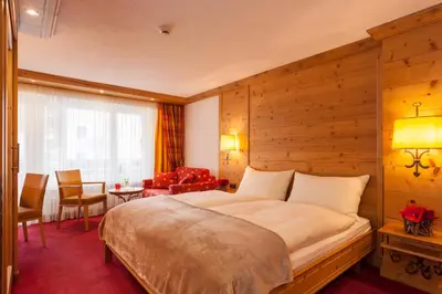 Ein Bett oder Betten in einem Zimmer der Unterkunft Hotel Holiday