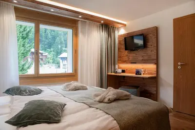 Ein Bett oder Betten in einem Zimmer der Unterkunft Hotel Hemizeus & Iremia Spa