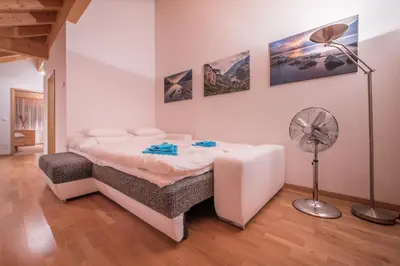 Ein Bett oder Betten in einem Zimmer der Unterkunft Apartment Lauberhorn, Luxury with best views