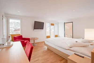 Ein Bett oder Betten in einem Zimmer der Unterkunft Hotel Bristol