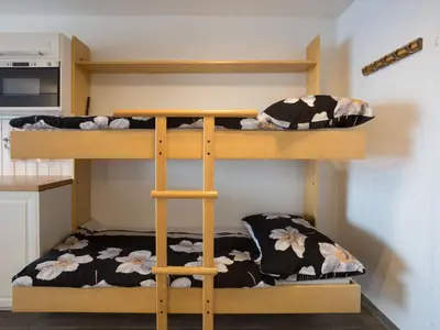 Ein Bett oder Betten in einem Zimmer der Unterkunft Studio Greppon 107 by Interhome