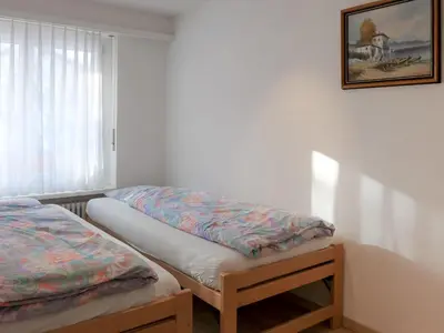 Ein Bett oder Betten in einem Zimmer der Unterkunft Apartment St- Bernhard by Interhome