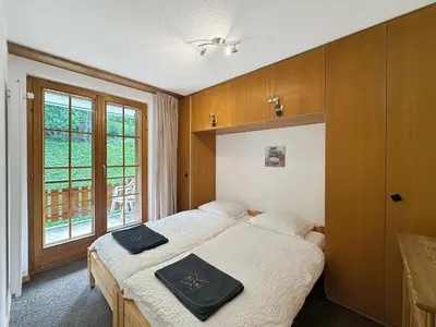 Ein Bett oder Betten in einem Zimmer der Unterkunft Les Mayens de l'Ours - At the foot of Piste de l'Ours' slope!