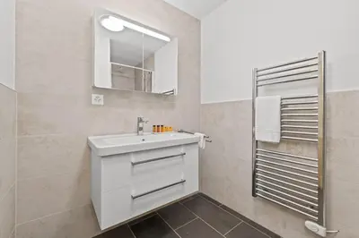 Ein Badezimmer in der Unterkunft Chalet Marmotte, à seulement 50m de la piste