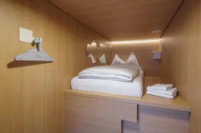 Ein Bett oder Betten in einem Zimmer der Unterkunft The Lab Capsule